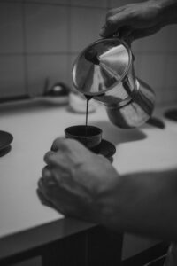 A man pours himself coffee