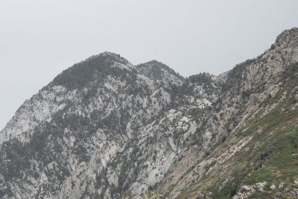 Mountain views behind La Caille wedding venue in Utah, showcasing the natural alpine landscape surrounding the outdoor ceremony lawn