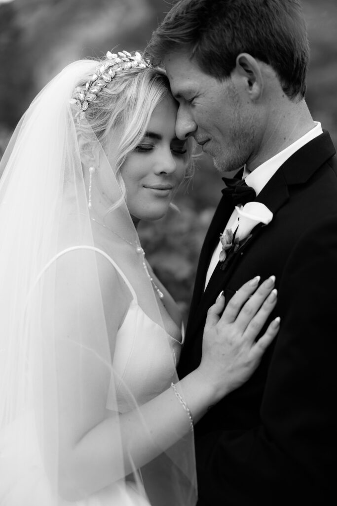 A portrait of a bride and groom at la caille wedding venue in Utah