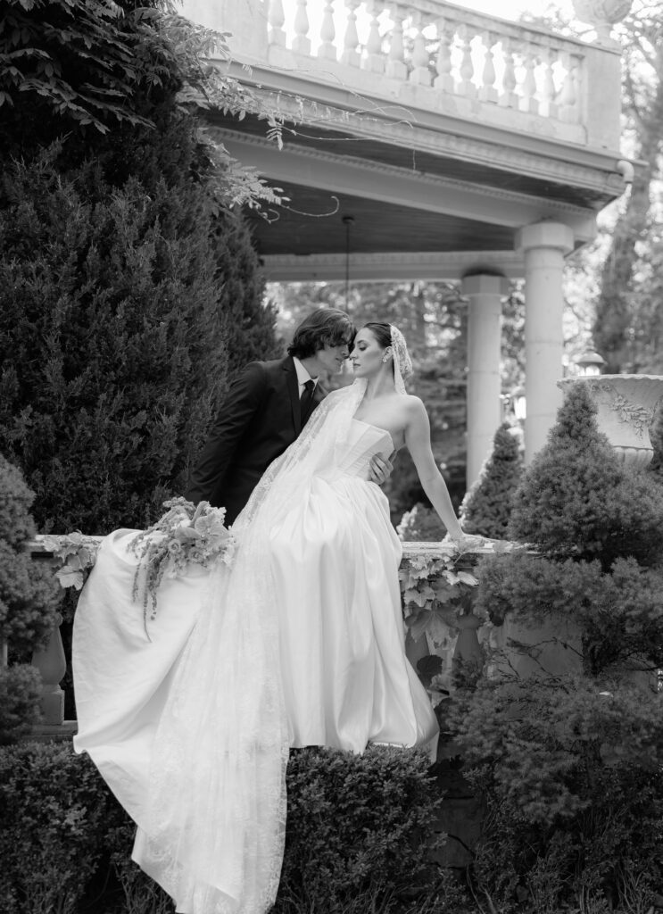 Black and white portrait of bride and groom at La Caille chateau during spring wedding