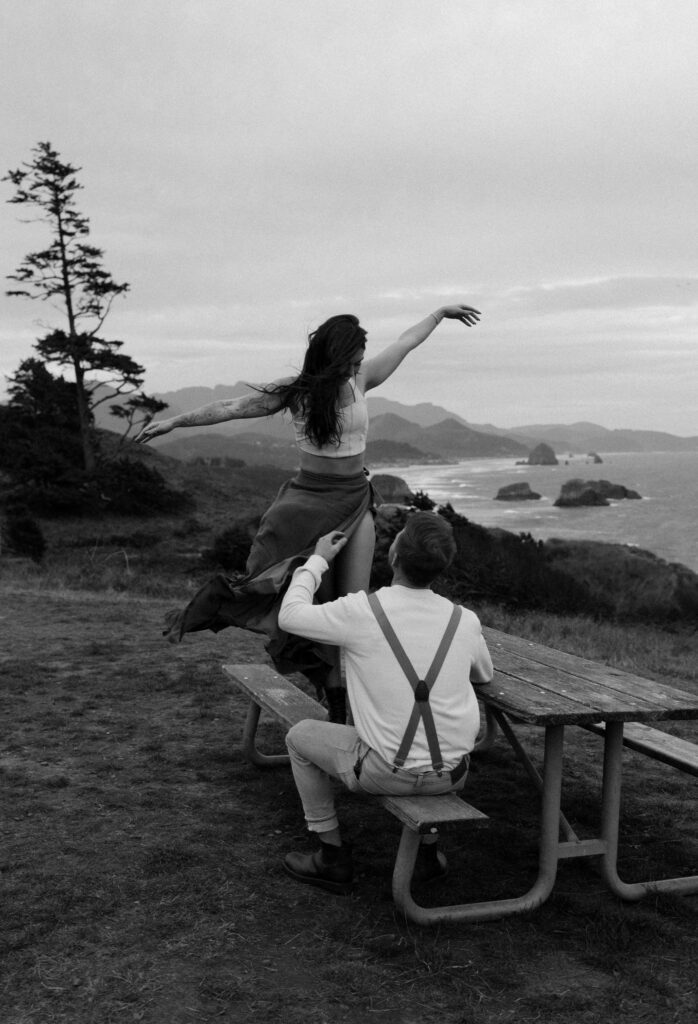 Couple at Ecola State Park overlook above the Oregon Coast, scenic elopement viewpoint