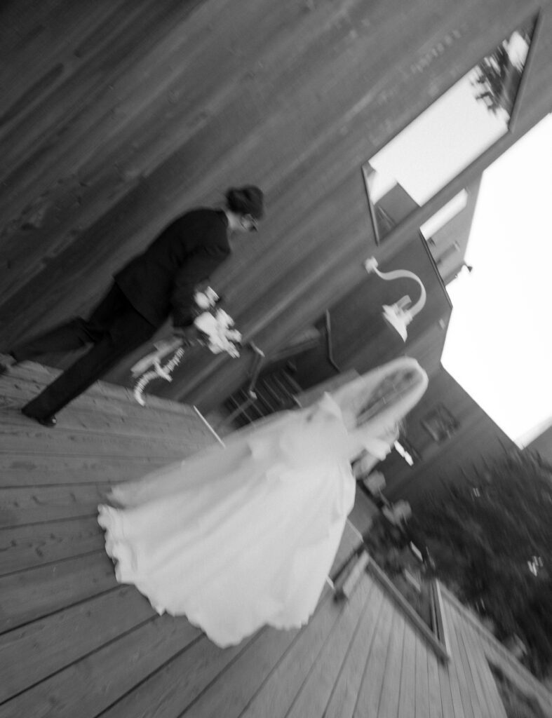 A bride and groom walking at sea ranch lodge