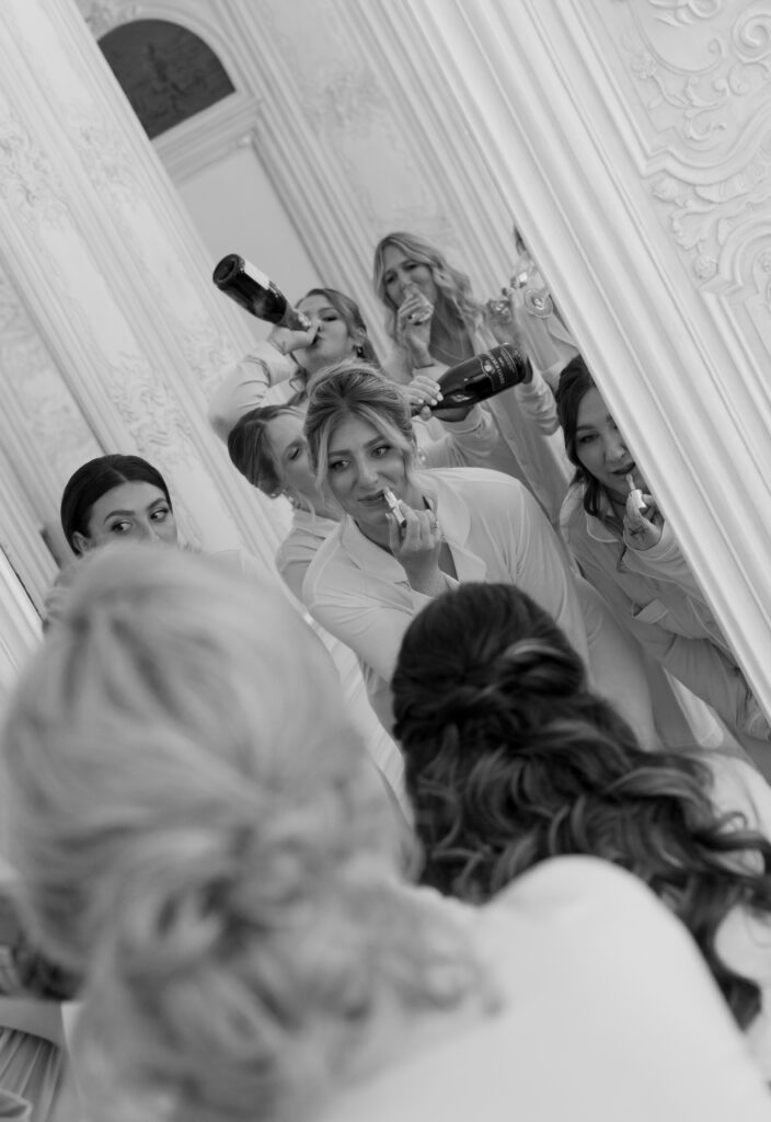 Bride and bridesmaids getting ready together inside the Chateau at La Caille