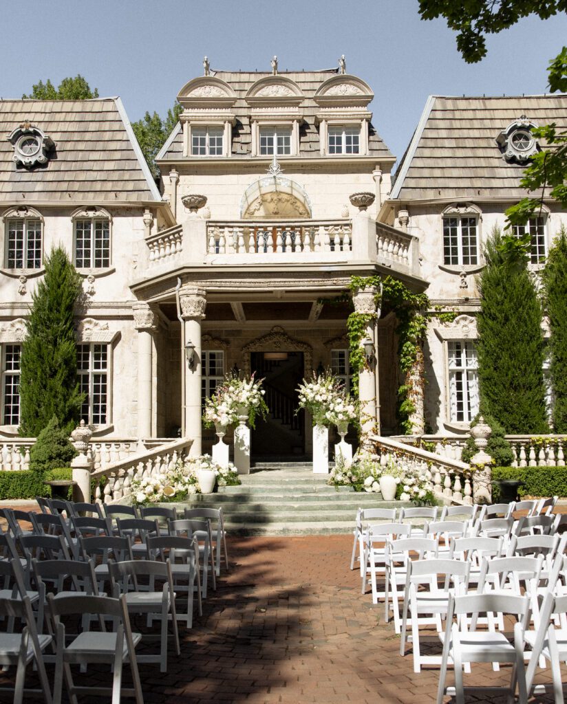Outdoor wedding ceremony in front of the Chateau at La Caille Utah