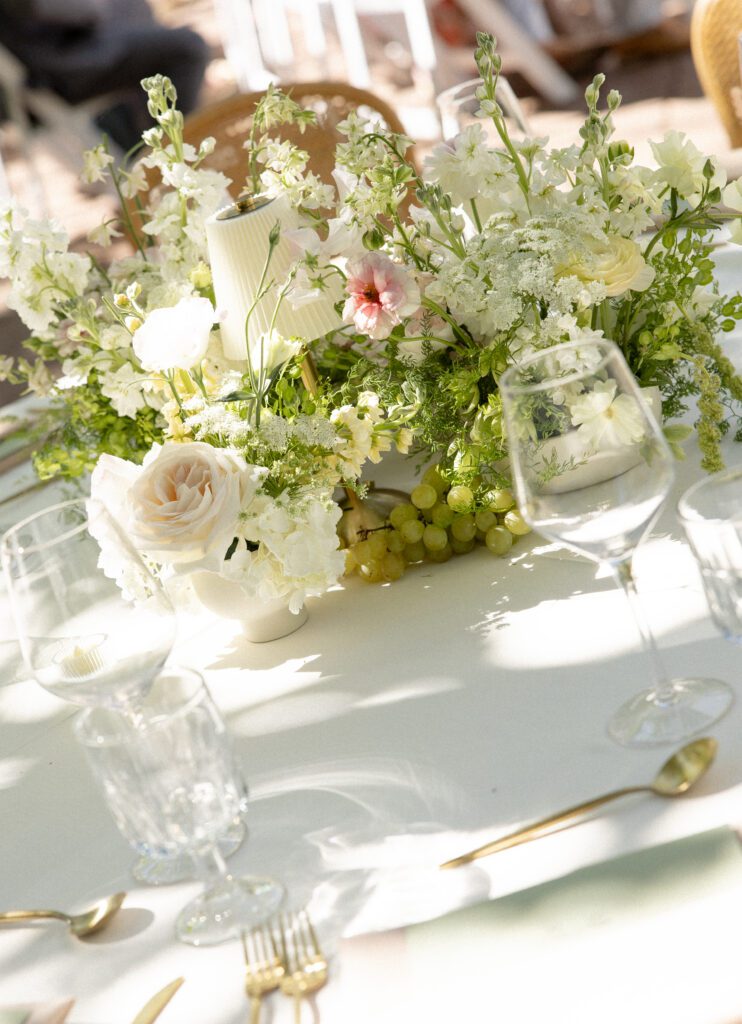 Elegant garden wedding tablescape with white florals at La Caille Utah